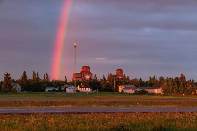 Rainbow over Waseca and its grain elevators